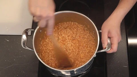 Cooking risotto overhead Stock Footage 112127928