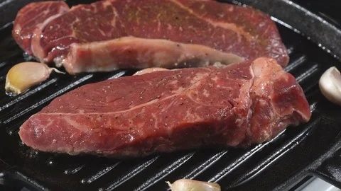 Cooking roast beef. The meat in a frying pan Stock Footage 72920558