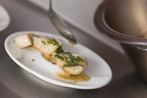 Cooking Saint-Jacques Stock Photos