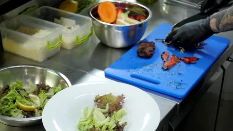 Cooking Salad with Grilled Vegetables Stock Footage 131634839