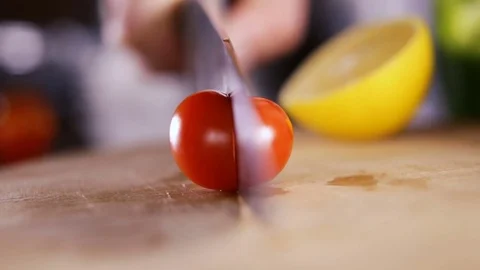 Cooking salad sequence. Vegetables table-top Stock Footage 73748943