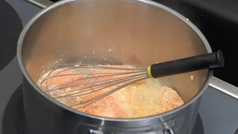 Cooking salmon in a pan Stock Footage 123874393