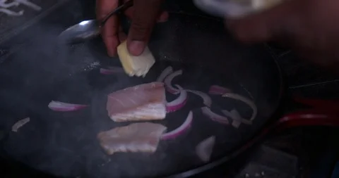 Cooking salmon in a pan in slow motion 2 Stock Footage 87846054
