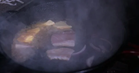 Cooking salmon in a pan in slow motion 3 Stock Footage 87846065