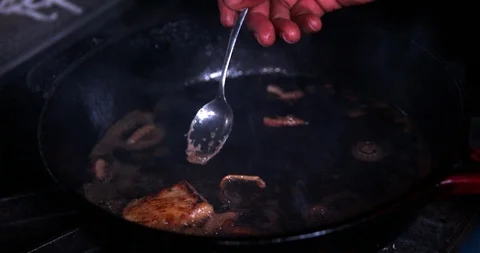 Cooking salmon in a pan in slow motion 5 Stock Footage 87846095