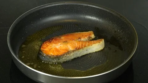 Cooking Salmon Steak On A Frying Pan, Macro Shot Stock Footage 131745525
