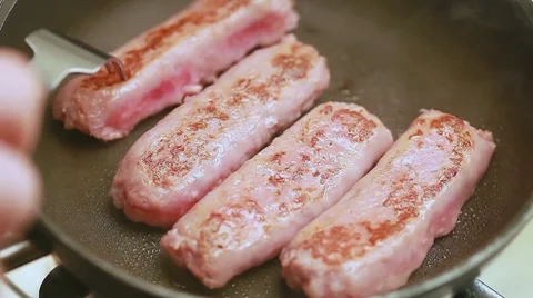 Cooking sausages Stock Footage 8569902