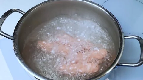 Cooking sausages Stock Footage 127272084
