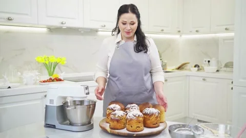 Cooking school. female cook easter cakes in the kitchen. video tutorial. Stock Footage 172378764