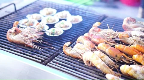 Cooking seafood on the grills Stock Footage 49366982