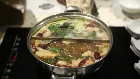 Cooking shabu-shabu Stock Footage 239845430