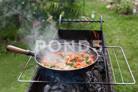 Cooking Shakshuka In The Pan On The Grill