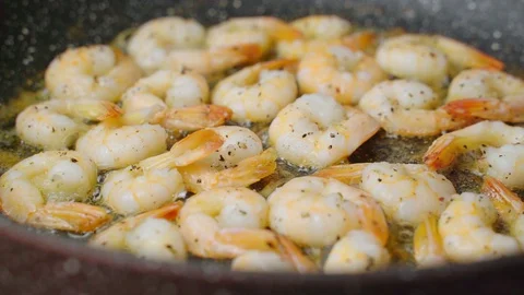 Cooking Shrimp in a pan Stock Footage 119259211