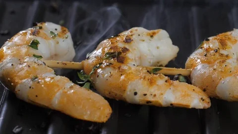 Cooking shrimps on the grill Stock Footage 113454855