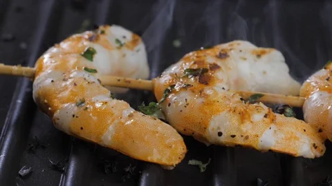 Cooking shrimps on the grill Stock Footage 113454885