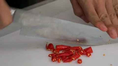 Cooking by Slice chili Stock Footage 74008425