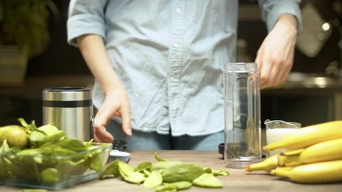 Cooking smoothies in the kitchen Stock Footage 127556012