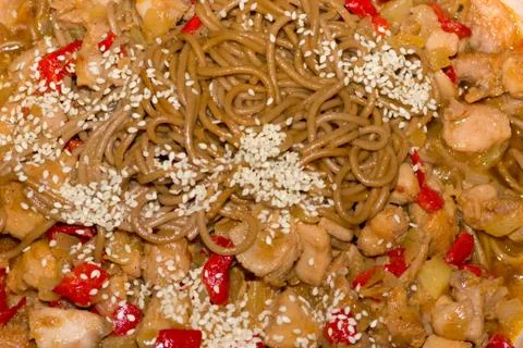 Cooking soba with vegetables and chicken Stock Photos
