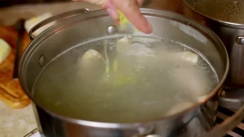 Cooking Soup with Bouillon cube Stock Footage 72961564