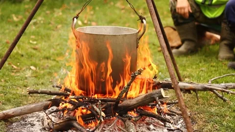 Cooking Soup on a Campfire Stock Footage 234808255