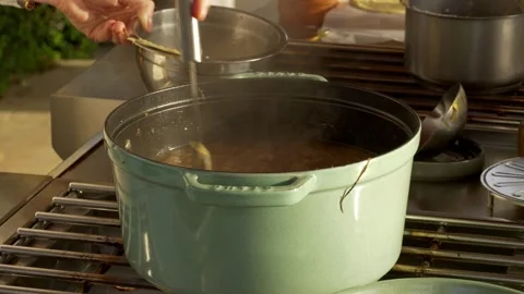 Cooking a soup Stockbeeldmateriaal 318105974