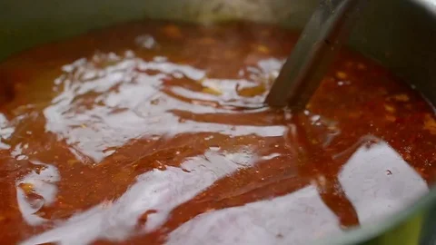 Cooking soup with lamb in a cauldron Видео 78726606
