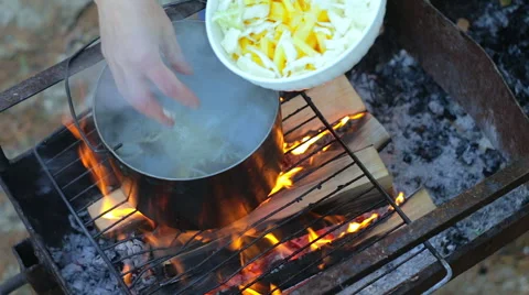 Cooking soup on real fire. Stock Footage 49414636