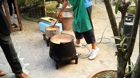Cooking soup on the road 動画素材 97346294