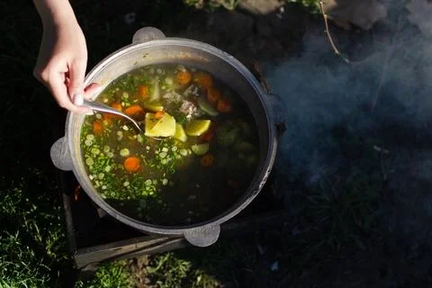Cooking soup at the stake Stock Photos
