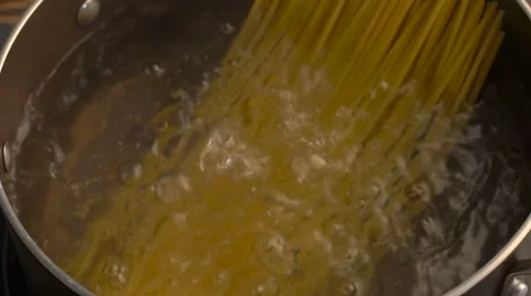 Cooking spaghetti in boiling water Stock Footage 62362524