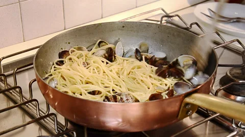 Cooking spaghetti with clams Stock Footage 32453567