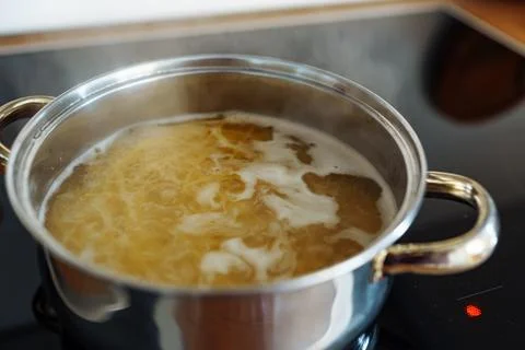Cooking spaghetti at home Stock Photos
