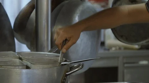 Cooking spaghetti in a professional pot Stock Footage 86203396