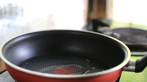 Cooking spicy shrimp with basil on a pan speed closeup Stock Footage 65049313