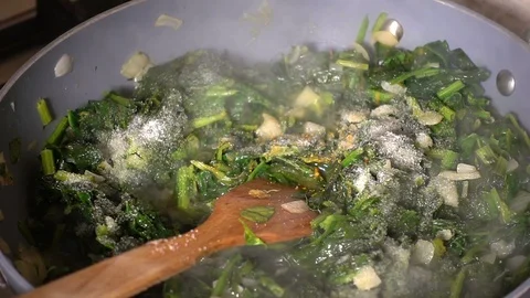 Cooking Spinach 1 Stock Footage 104898367