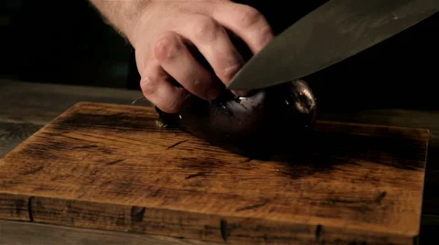 Cooking Squash. Chief's Hands Cutting Eggplant. Close - Up Shot Stock Footage 66234737