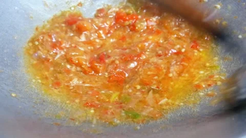 Cooking squid fried chili sauce in a frying pan Stock Footage 310980285