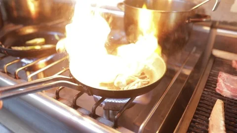 Cooking squid in a hot pan Stock Footage 102519146