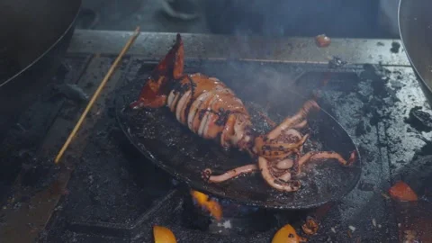 Cooking squid on a hot pan Stock Footage 308002336