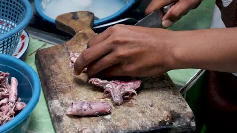 Cooking squid meat Stock Footage 276150037