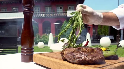 Cooking Steak. Chef Pours Sauce Steak Stock Footage