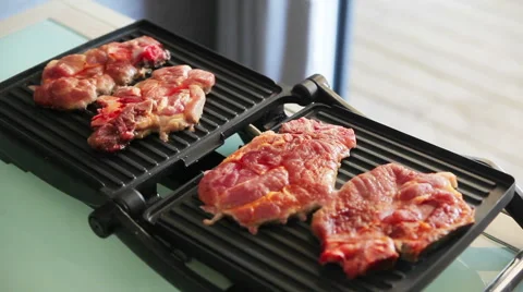Cooking steak on an electric grill Stock-Footage 61950204