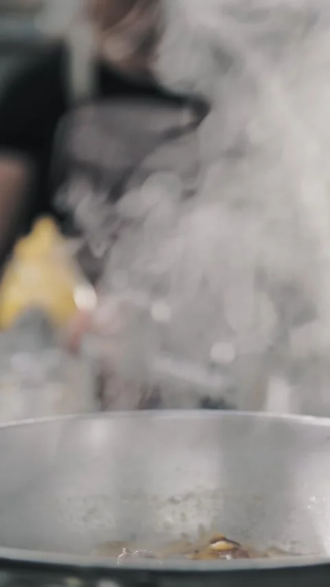 Cooking. steaming food. buffet restaurant kitchen. Close-up. food is steamming, Stock Footage 319016745