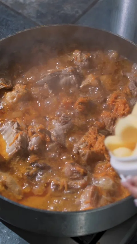 Cooking. stew. buffet restaurant kitchen. Close-up. food is steaming, boiling in Stock Footage 318806701