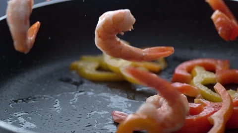 Cooking stir fry in slow motion; shot on Phantom Flex 4K at 1000 fps Stock Footage