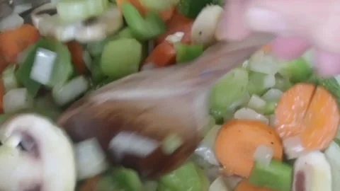 Cooking: Stirring Vegetables in pan Video stock 278348074