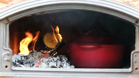 Cooking in stone oven. Stock Footage 231326137