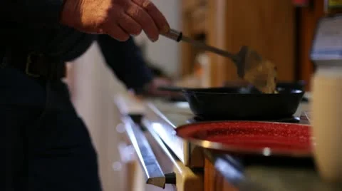 Cooking on stove Stock Footage 21236088