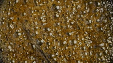 Cooking sugar syrup in close up Stock Footage 56317472