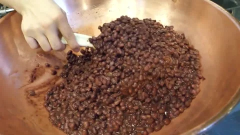 Cooking Sweet Adzuki Bean Paste in a Traditional Copper Pot 스톡 동영상 345291269